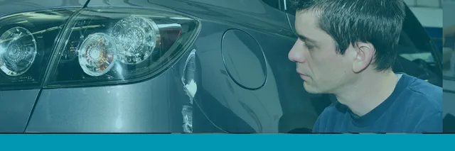 automotive radar sensor mounted behind front grille